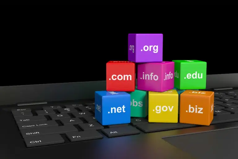 Domain name extensions on cubes on a laptop keyboard